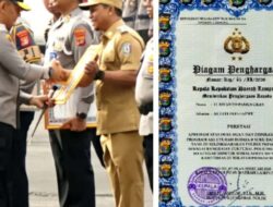 Bupati Pringsewu Raih Penghargaan dari Kapolda Lampung